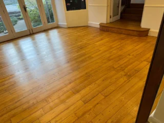 Steps and second room of oak floor restoration